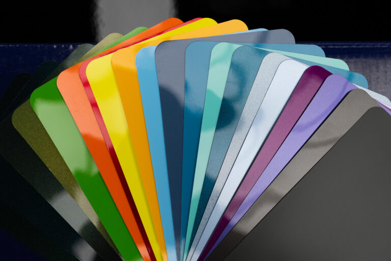 Fanned swatches showing the 200-plus colours of Defcon Films Australia Spectra colour paint protection film